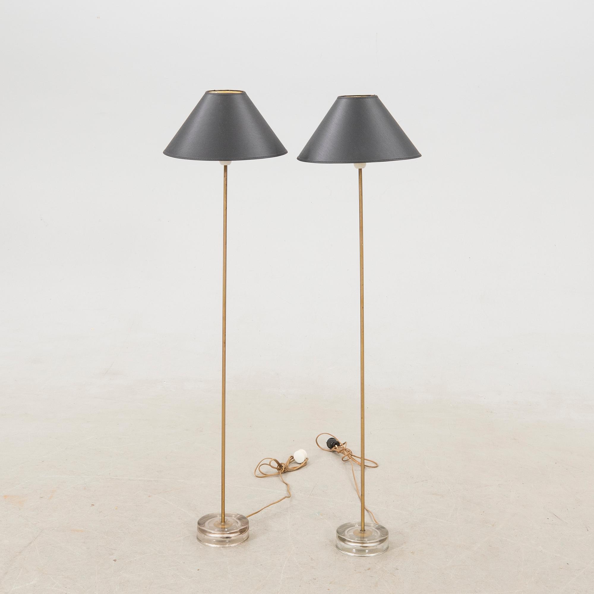 A pair of floor lamps, 1960s.