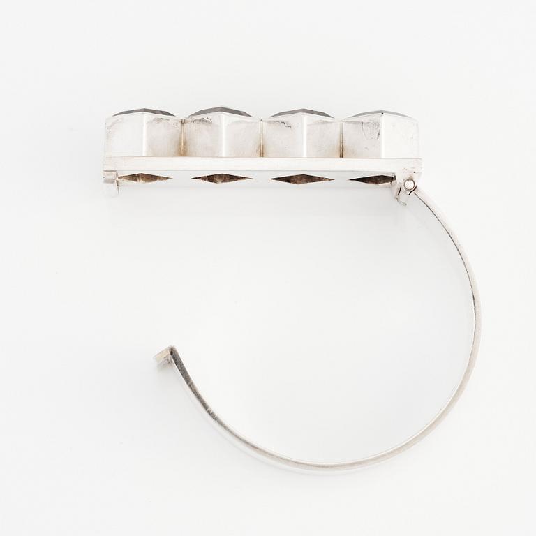 Sigurd Persson, a sterling silver, part gilt bangle with smoky qvartz (citrine), Stockholm 1963, executed by silversmith Peter Schmitt.