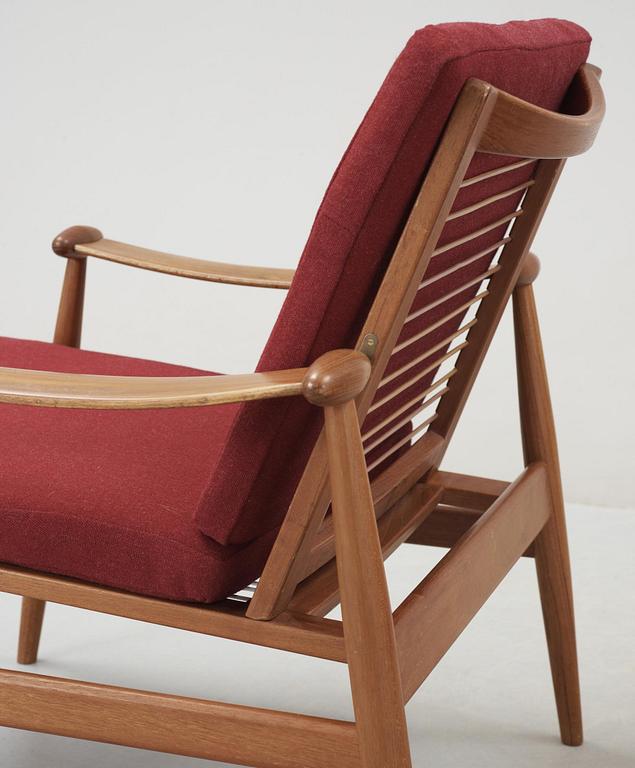 A pair of Finn Juhl teak easy chairs , model 133, France & Son, Denmark.