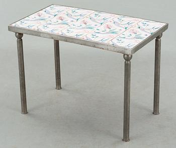 A tiled top Tyra Lundgren pewter based table,