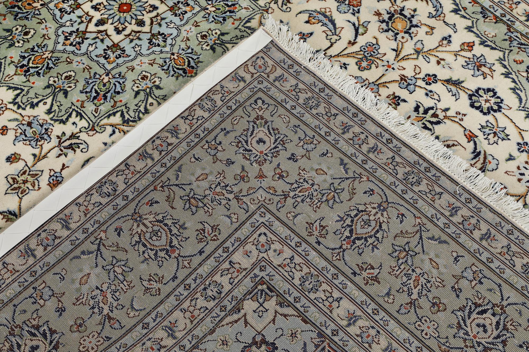 A Keshan carpet, 310 x 206 cm.