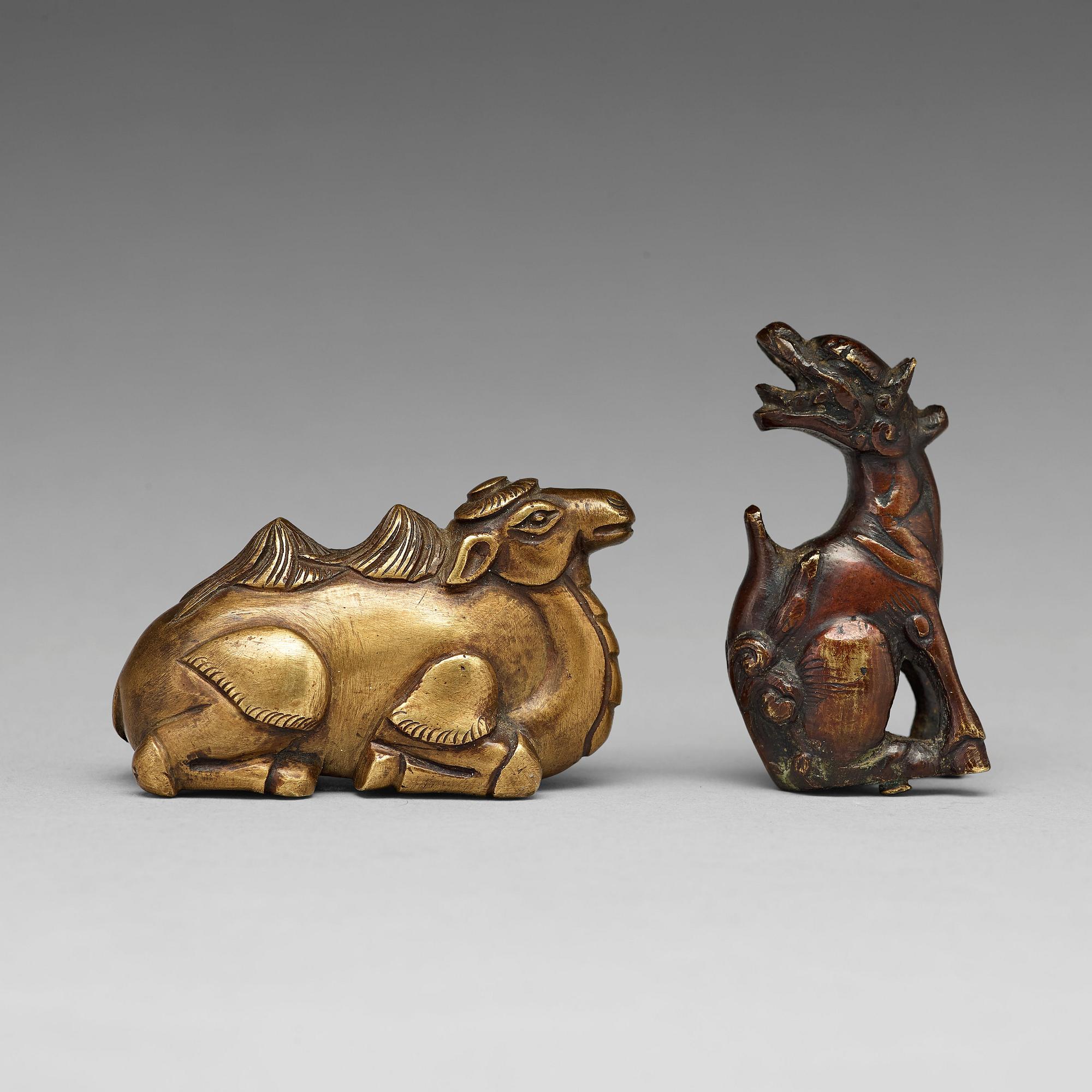 Two bronze pen rests, Qing dynasty, 18th Century.