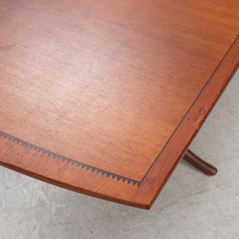 A mahogany and rosewood veneered dining table, mid 20th Century.
