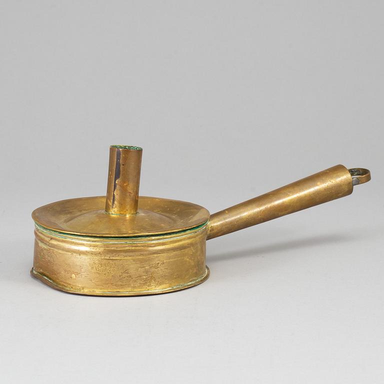 An 18th century brass nignt light holder.