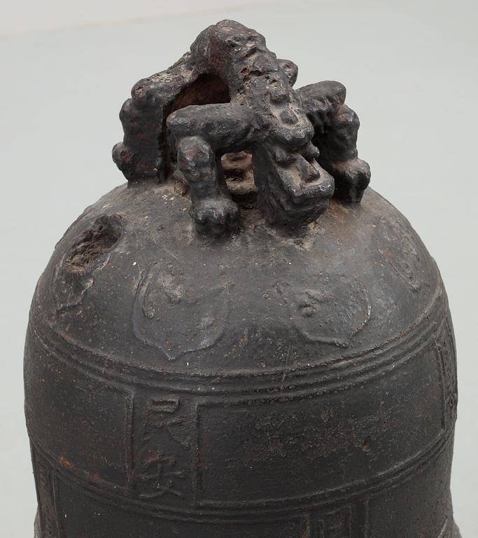 A large bronze temple bell, presumably Ming dynasty.