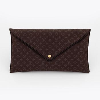 Louis Vuitton, a monogram "Trousse kit de voyage' travel kit with inflatible pillow and eye mask.