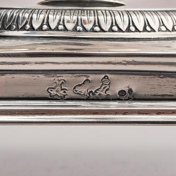 Lockurna, silver med blå glasinsats, Frankrike 1800-talets början.