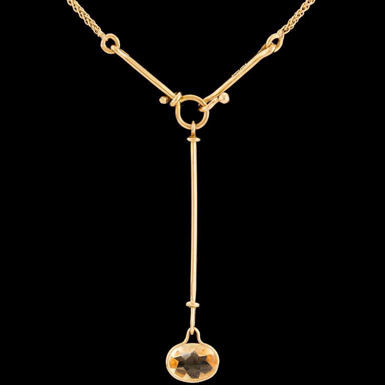 A 'Savannah' pendant set with a faceted citrine by Vivianna Torun Bülow Hübe for Georg Jensen, designed 2006.