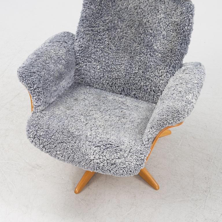 An 'Air' armchair with ottoman, Conform, 21st century.