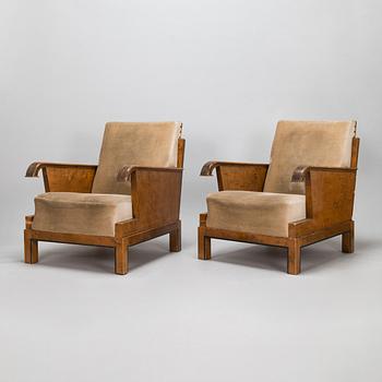 A pair of 1930's armchairs.