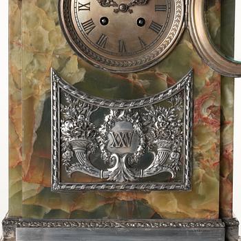 A silver jubilee hardstone and silver mantle clock by W.A. Bolin, Moscow 1912-1017.