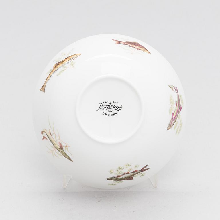 A 25-piece porcelain fish dinnerware set for Rörstrand.