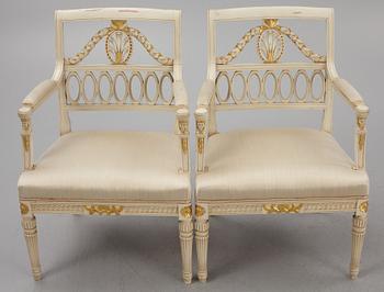 A pair of Empire style armchairs, 20th century.
