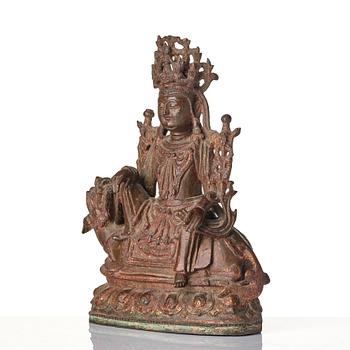 A Chinese bonrze figure of a Budha, probably late Ming dynasty 17th century.