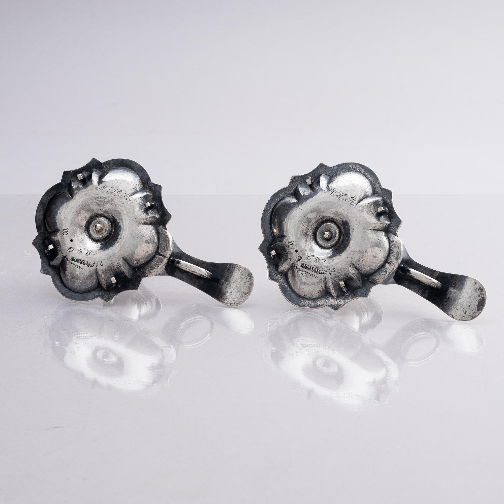 A pair of Swedish 18th century silver chamber-candlesticks, marks of Jürgen Friedrich Sickman, Stockholm 1757.