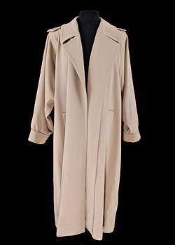 387. A beige wool coat by Yves Saint Laurent.