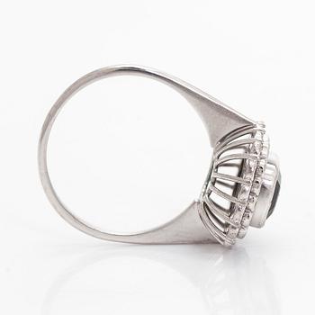 RING, fasettslipad turmalin, åttkantslipade diamanter, 18K vitguld. A. Tillander, Helsingfors 1975.