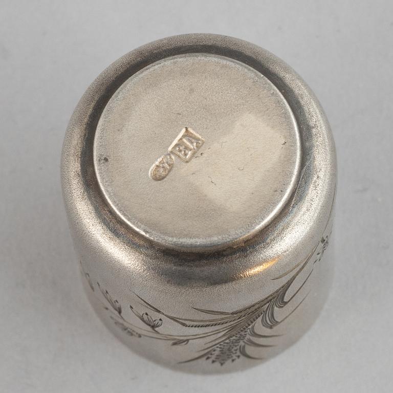 A set of Russian silver beakers and a salt cellar.