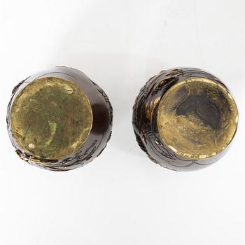 A pair of Japanese metal vases, Meiji (1868-1912).