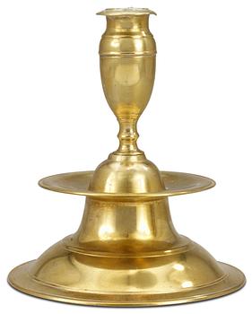 1034. A Baroque brass candlestick.