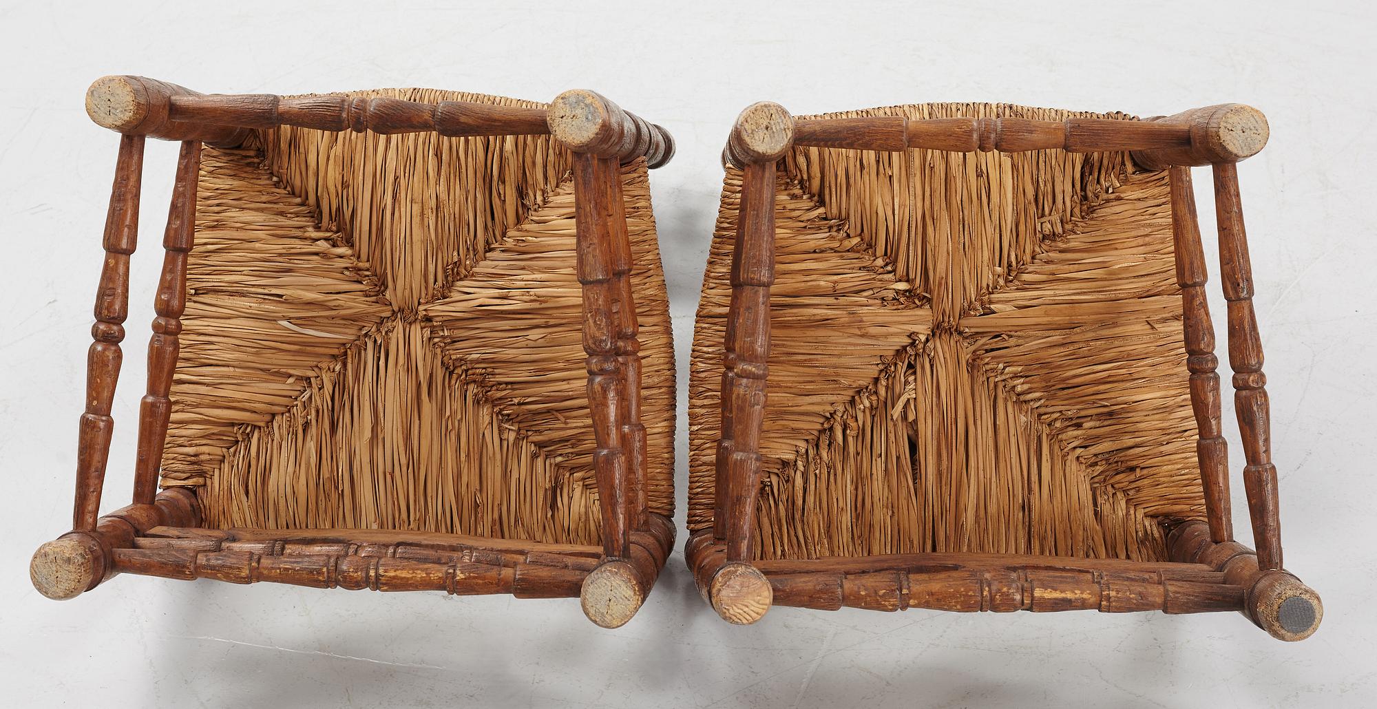 A pair of Spanish colonial style ladder-back chairs, circa 1900.
