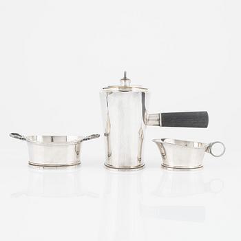 A Swedish Silver Coffee Pot, Creamer and Sugar Bowl, GAB, Stockholm 1949.