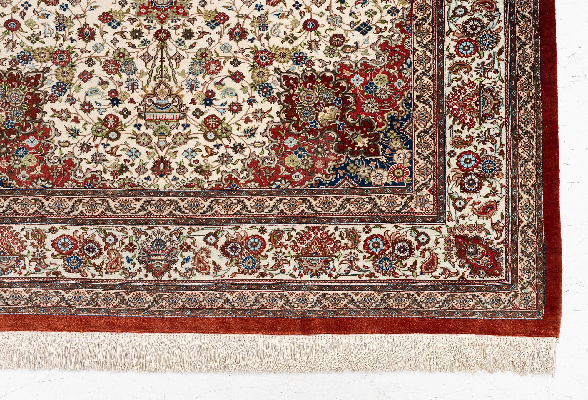 A silk Qum, Central Persia, signed Jashmedi c. 141 x 103 cm.