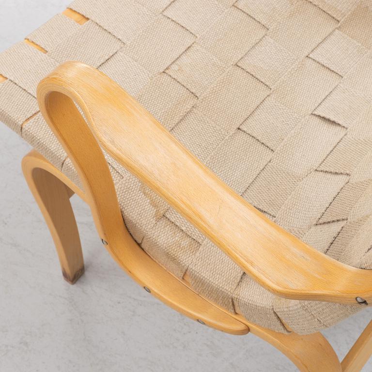 Bruno Mathsson, a pir of 'Eva' armchairs, Dux, late 20th century.