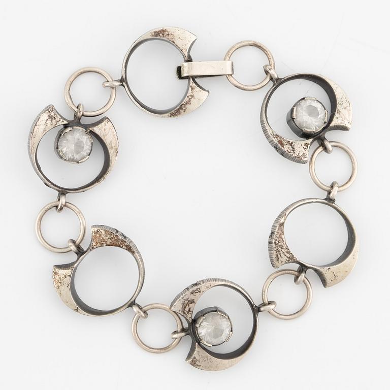 Karl Laine, ring, pendant, and bracelet, silver with rock crystal.