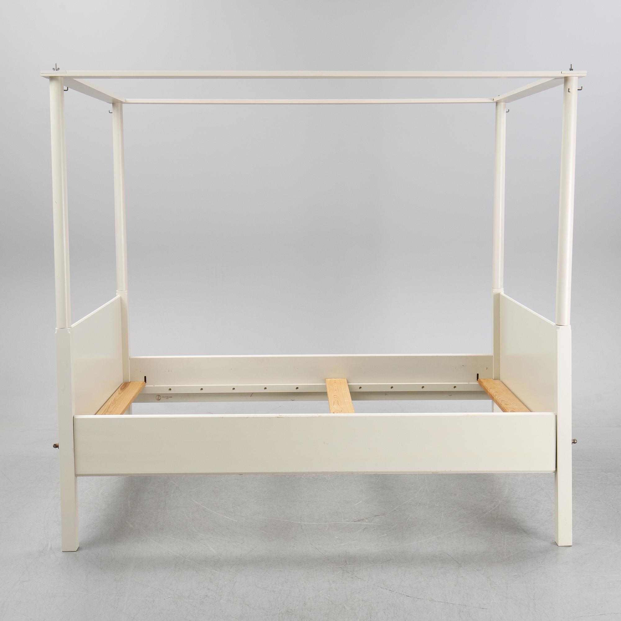 A 'Skattmansö' four poster bed, Ikea, 1990's.