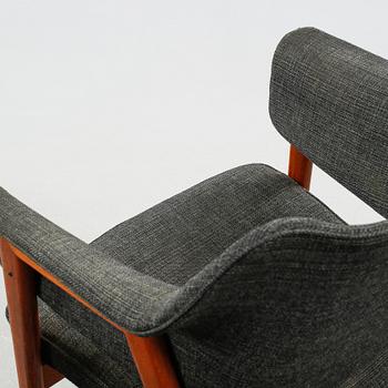 A pair of armchairs designed by Karl-Erik Ekselius for JOC, Vetlanda, made around the middle of the 20th century.