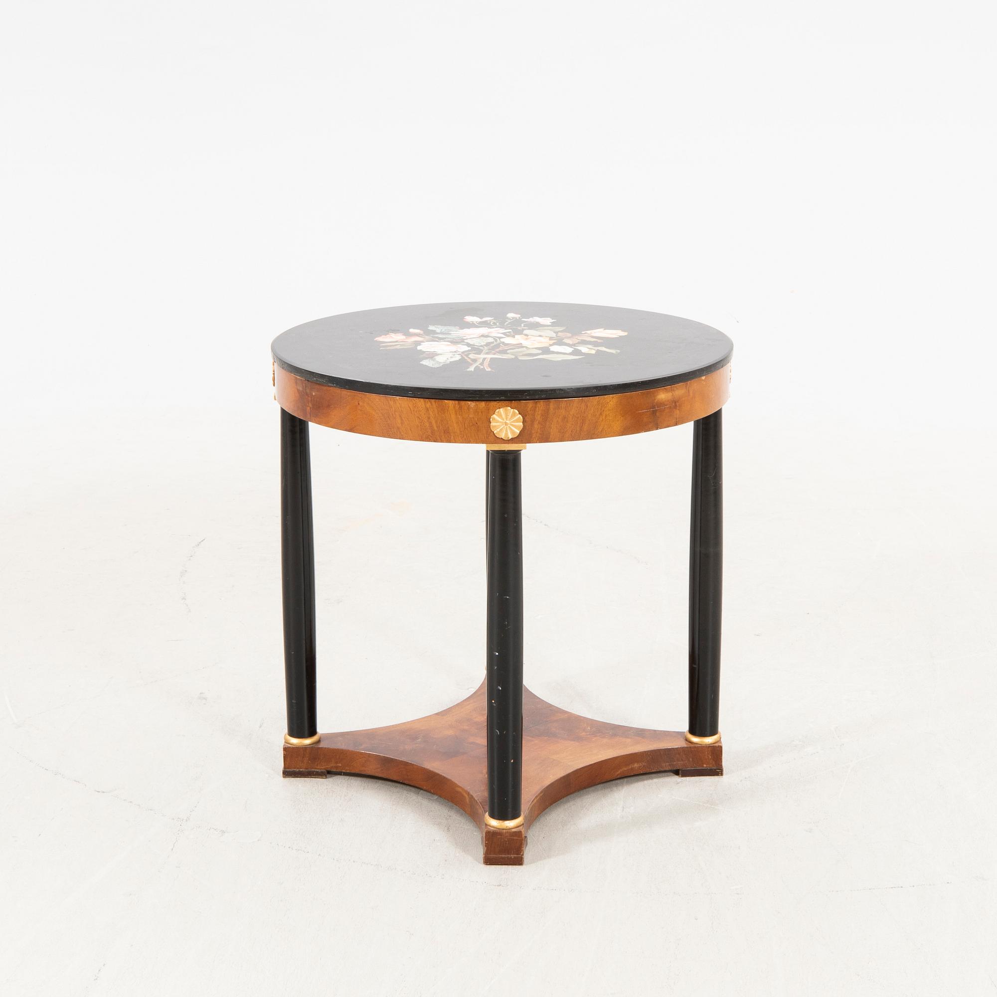An empire style table with pietradura top around 1900.