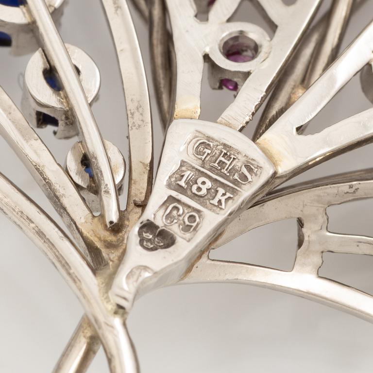 Brooch 18K white gold with white stones and coloured stones. Gerdt Sandqvist, Stockholm 1953.