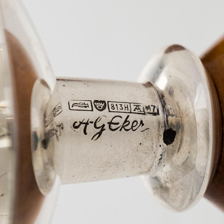 Anna-Greta Eker, a pair of silver and mahogny candlesticks, Auran Kultaseppä, Turku 1965.