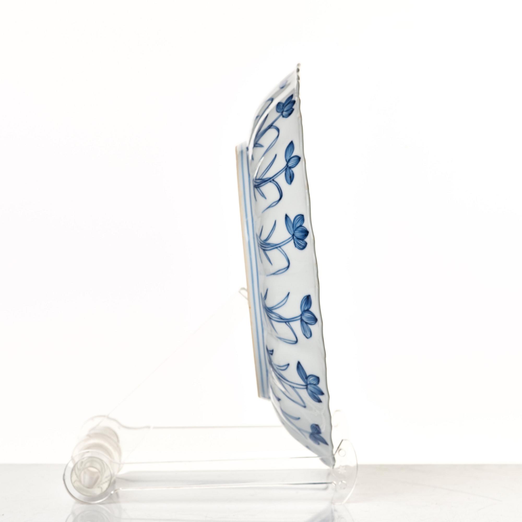 A set of 12 blue and white dishes, Qing dynasty, Kangxi (1662-1722).