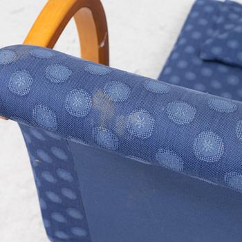 Markku Pakkanen, a pair of 'Harlekiini' armchairs, Asko, Finland, late 20th Century.