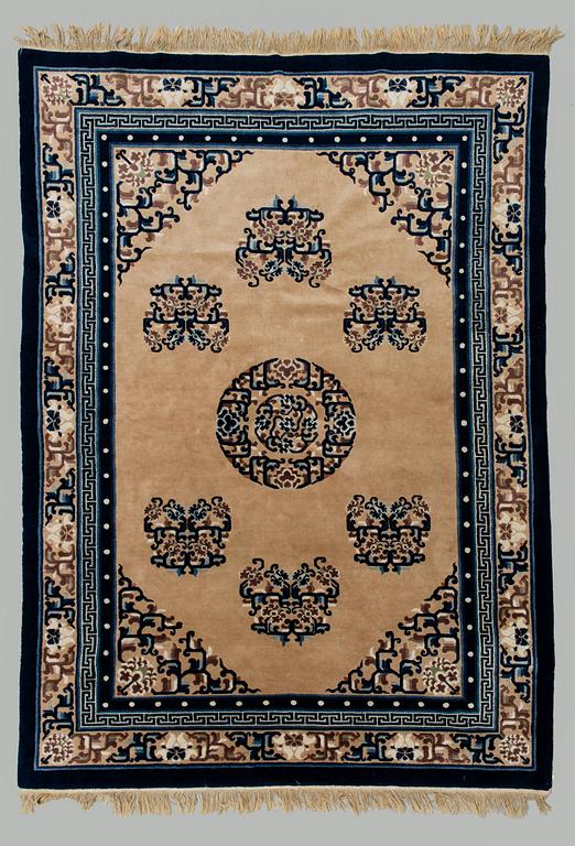 A Chinese carpet, ca 244 x 168 cm.