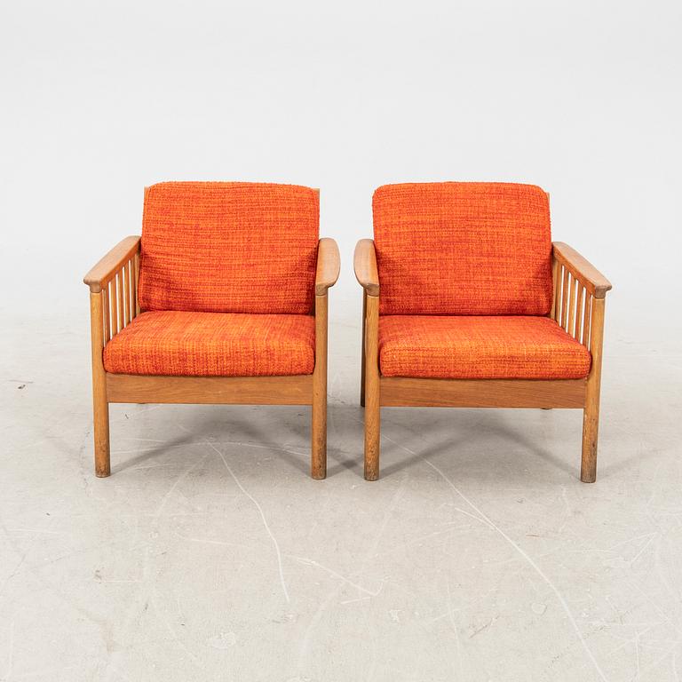 An oak easy chair ans sofa "Tiveden" by Gunnar Myrstrand & Sven Engström from the middle of the 20th century.