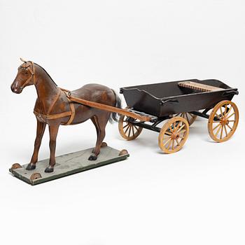 Horse-drawn carriage, early 20th century.