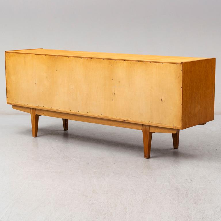 a 1960's oak sideboard by Er4ik Wörtz for Ikea.