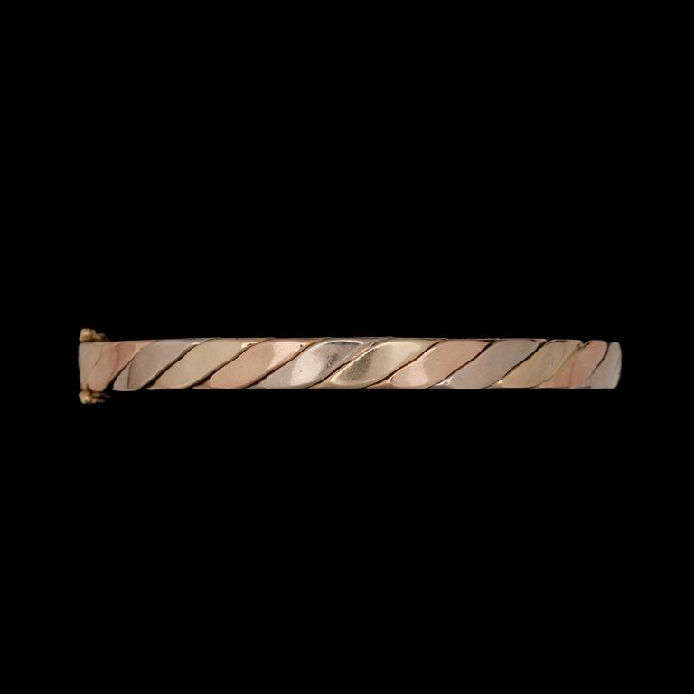 ARMRING, 14k trefärgat guld. Vikt 20,5g.