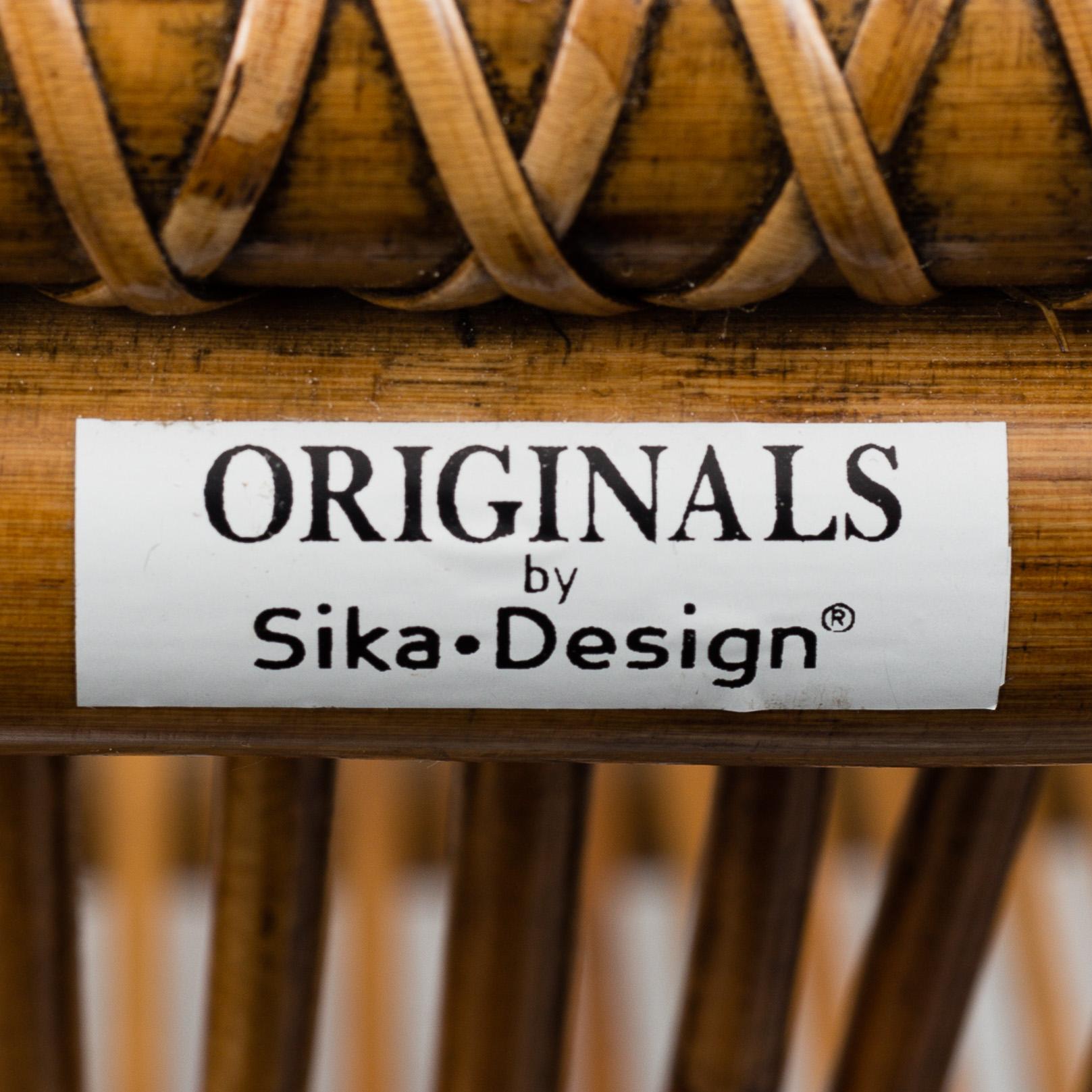 A pair of bamboo and rattan easy chairs, Sika-Design.