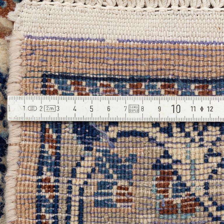 A carpet, possibly Yasd, c. 459 x 309 cm.