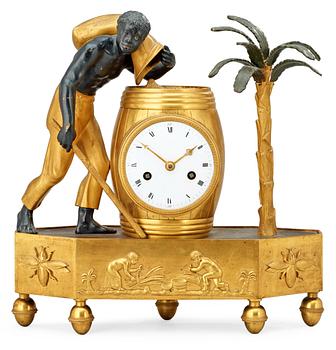 578. A French Empire early 19th century mantel clock.