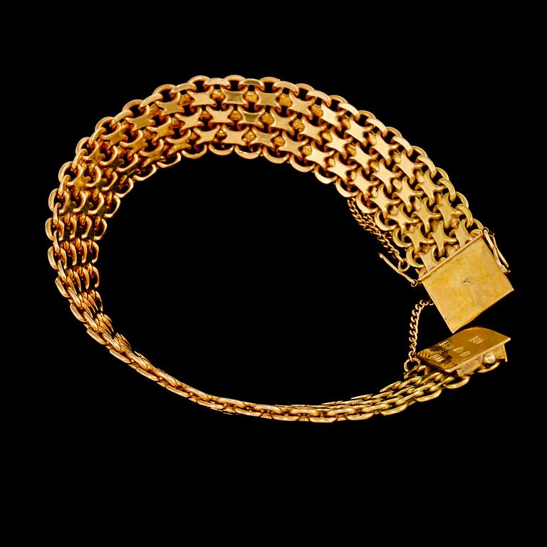 ARMLÄNK, 18K guld, Mary Kvochs guldsmedsatelje,  Stockholm, 1957. Vikt 35,4 g.