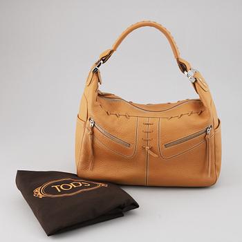 TOD'S, a tan leather bag.