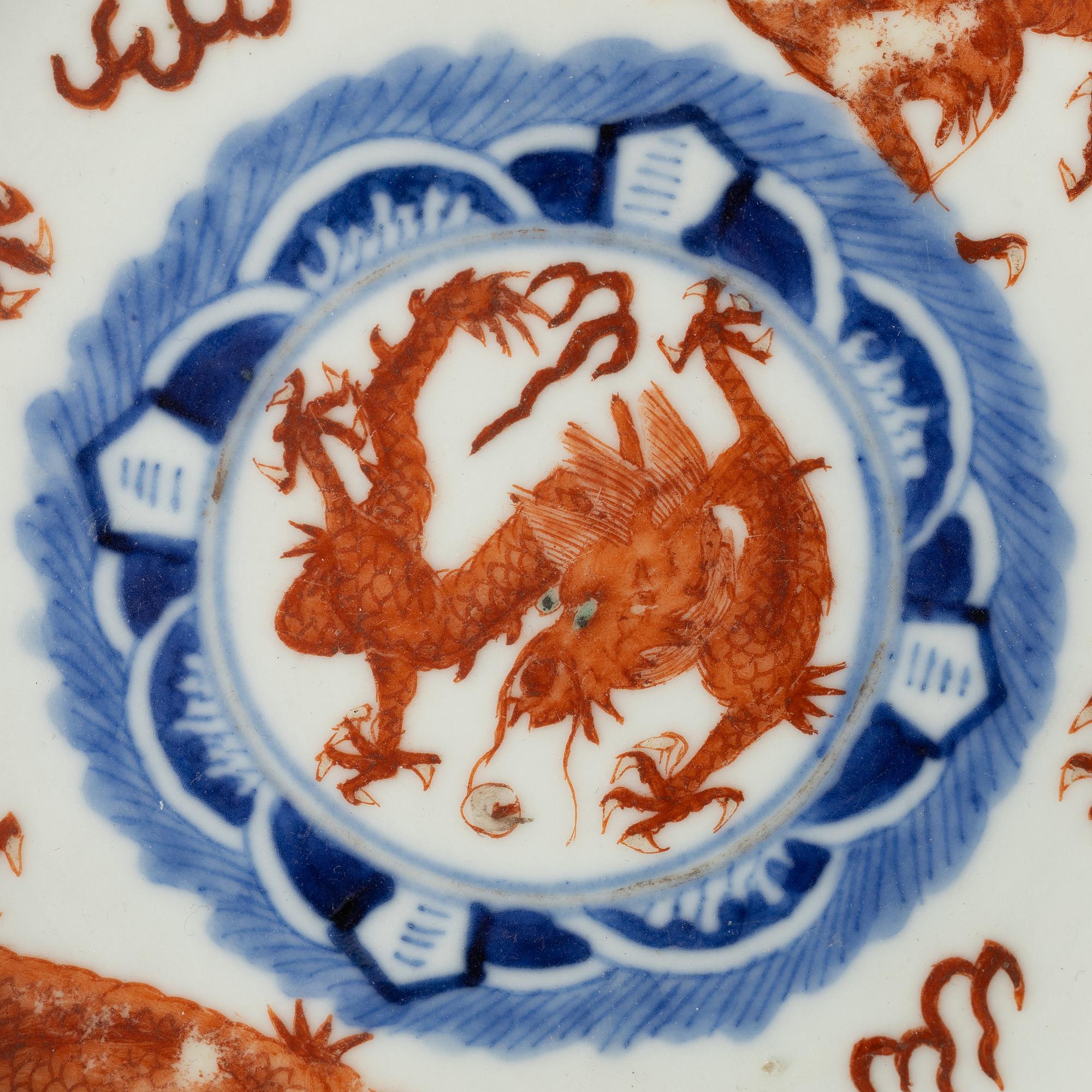 A pair of dragon dishes, Qing dynasty with Guangxu six character mark and of the period (1875-1908).