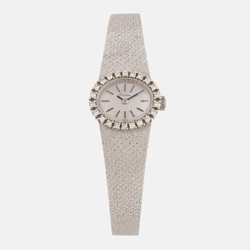 A Certina ladies watch, 18K gold and diamonds.