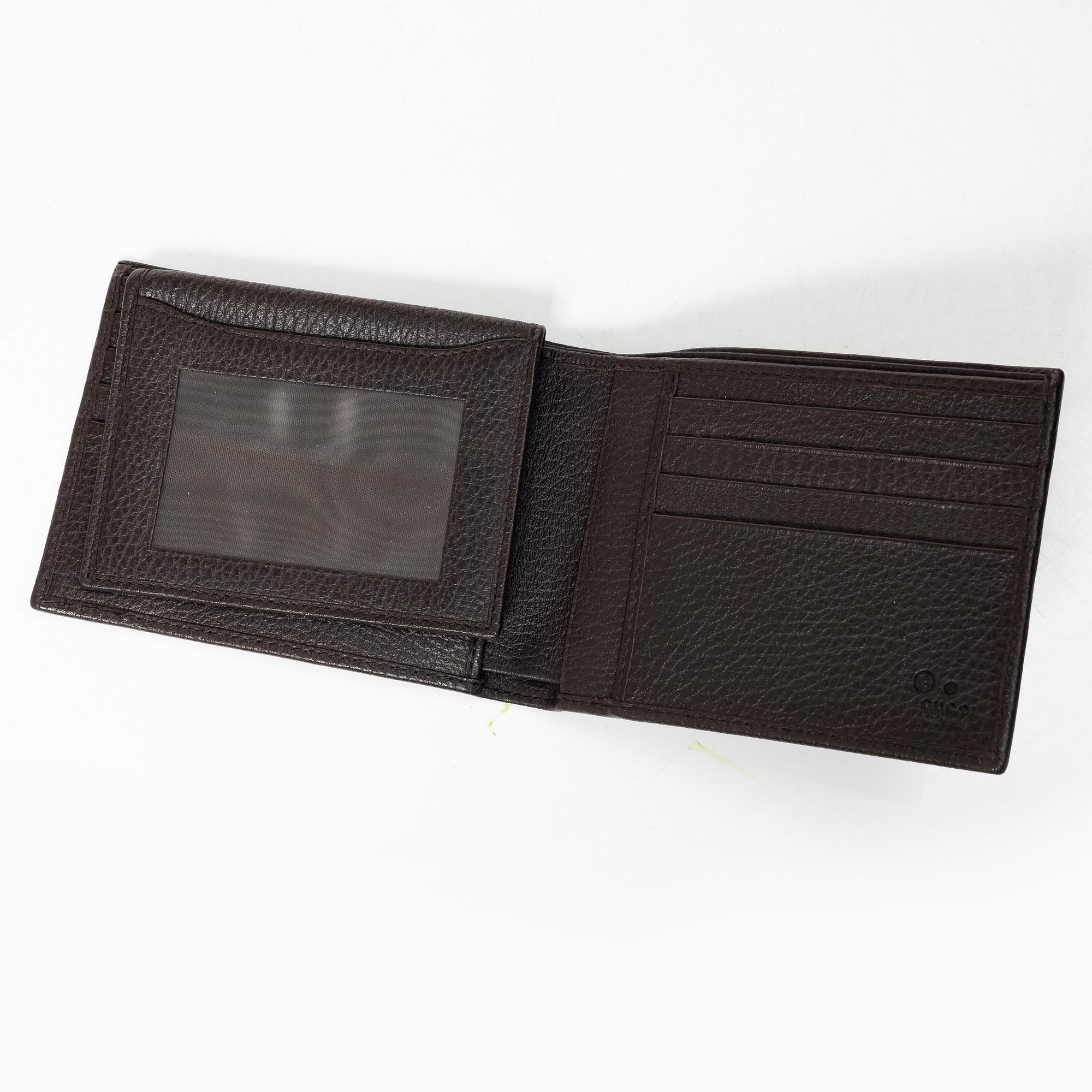 Gucci, wallet and belt.