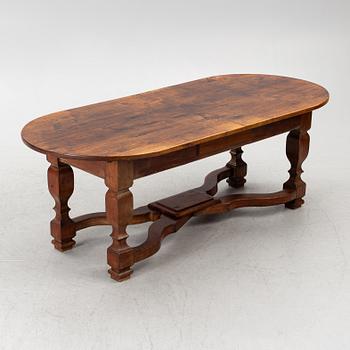 An oak dining table, Baroque early 18th century and Baroque style 19th/20th century.